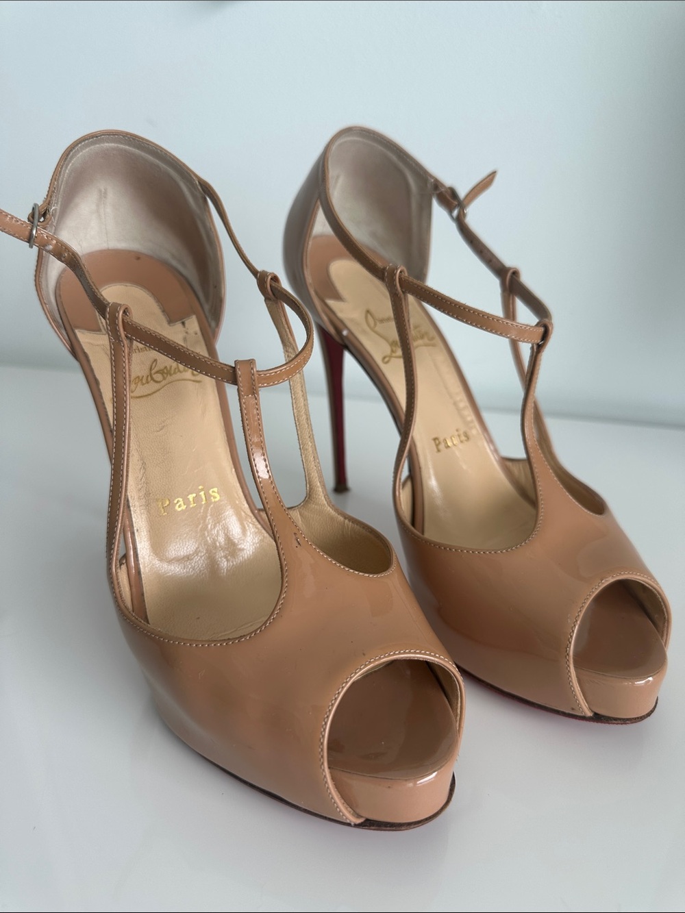 Christian Louboutin Nude Patent T-Strap Peep-Toe Pumps with Red Soles
